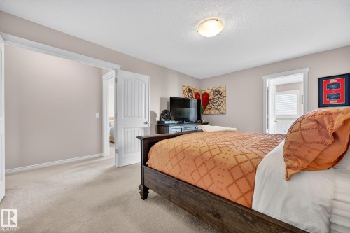 Carpeted bedroom with baseboards - 1734 63A Street, Edmonton, AB - Indoor Photo Showing Bedroom