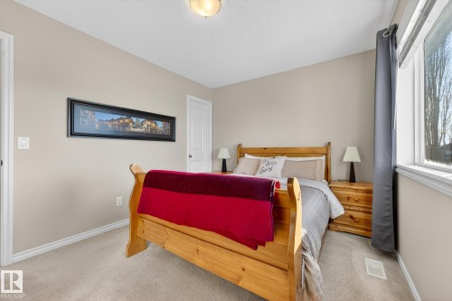 Carpeted bedroom with baseboards - 1734 63A Street, Edmonton, AB - Indoor Photo Showing Bedroom