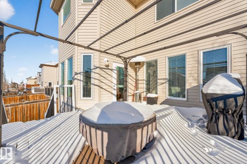 Wooden deck featuring a grill - 1734 63A Street, Edmonton, AB - Outdoor With Deck Patio Veranda With Exterior