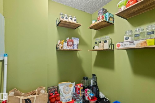 Pantry area with a textured ceiling - 1925 Saddleback Road, Edmonton, AB - Indoor Photo Showing Other Room