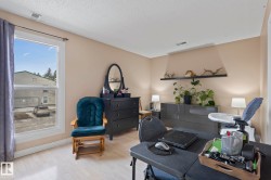 Primary Room with wood finished floors and a textured ceiling - 