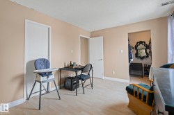 Primary Room featuring light wood-style flooring and a textured ceiling - 