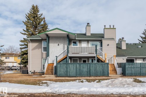 View of front facade featuring stairway - 1925 Saddleback Road, Edmonton, AB - Outdoor With Balcony