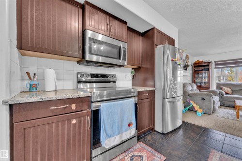 2004 32 Street, Edmonton, AB - Indoor Photo Showing Kitchen With Stainless Steel Kitchen