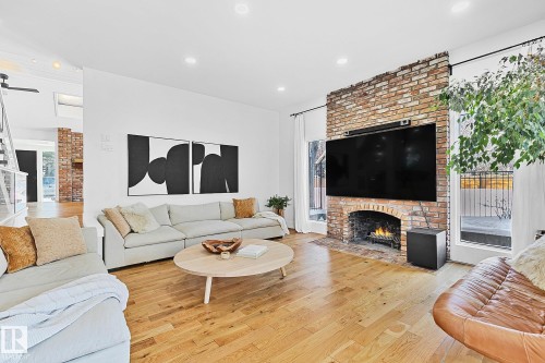 100 Wolf Willow Crescent, Edmonton, AB - Indoor Photo Showing Living Room With Fireplace