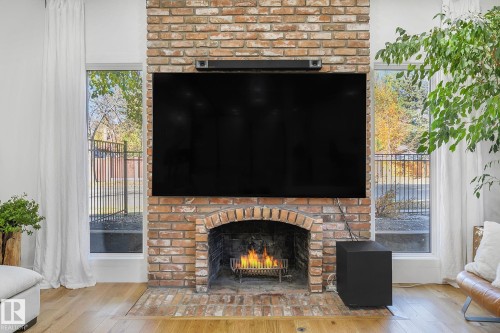 100 Wolf Willow Crescent, Edmonton, AB - Indoor Photo Showing Living Room With Fireplace