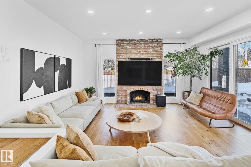 100 Wolf Willow Crescent, Edmonton, AB - Indoor Photo Showing Living Room With Fireplace