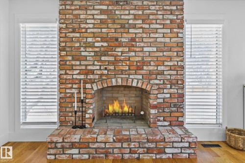 100 Wolf Willow Crescent, Edmonton, AB - Indoor Photo Showing Living Room With Fireplace