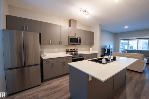 1527 16 Avenue, Edmonton, AB - Indoor Photo Showing Kitchen With Stainless Steel Kitchen With Double Sink