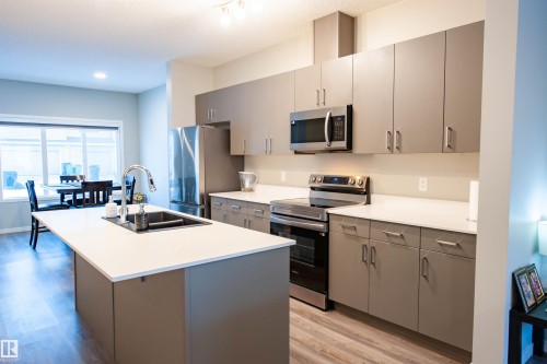 1527 16 Avenue, Edmonton, AB - Indoor Photo Showing Kitchen With Stainless Steel Kitchen With Double Sink