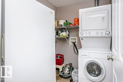 325 7801 Golf Course Road, Stony Plain, AB - Indoor Photo Showing Laundry Room