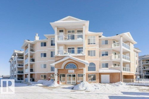 325 7801 Golf Course Road, Stony Plain, AB - Outdoor With Balcony With Facade