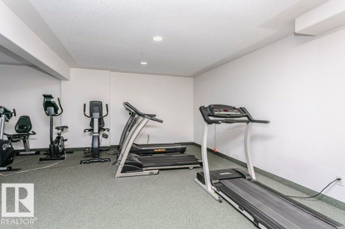 325 7801 Golf Course Road, Stony Plain, AB - Indoor Photo Showing Gym Room