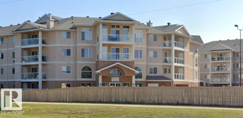 325 7801 Golf Course Road, Stony Plain, AB - Outdoor With Balcony With Facade