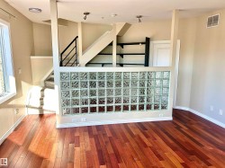 Stairs featuring wood-type flooring - 