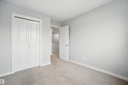 Unfurnished bedroom featuring carpet floors and a closet - 