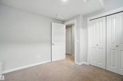 Unfurnished bedroom featuring carpet floors and a closet - 