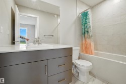 Full bath with shower / bath combo with shower curtain and vanity - 