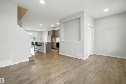 Unfurnished living room featuring recessed lighting and light wood-style flooring - 