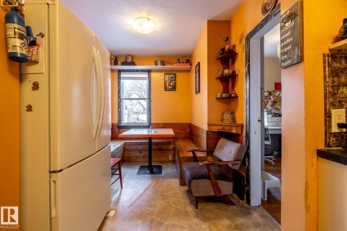 Home office with wainscoting and light stone finish floors - 11240 84 Street, Edmonton, AB - Indoor