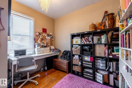 Home office featuring dark wood-style floors - 11240 84 Street, Edmonton, AB - Indoor Photo Showing Office