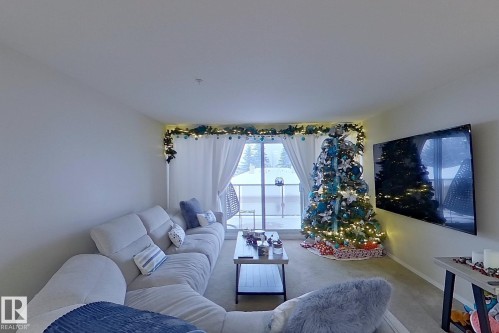 208 10421 42 Avenue, Edmonton, AB - Indoor Photo Showing Living Room