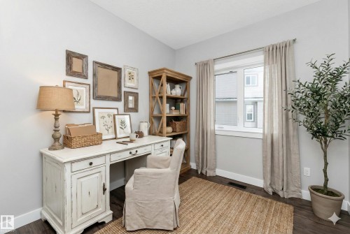 Office space with baseboards and dark wood-type flooring - 62 Ellice Bend, Fort Saskatchewan, AB - Indoor Photo Showing Office