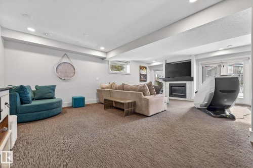4001 Triomphe Boulevard, Beaumont, AB - Indoor With Fireplace