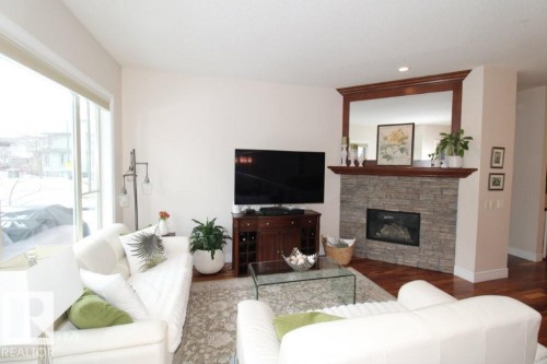176 Ambleside Drive, Edmonton, AB - Indoor Photo Showing Living Room With Fireplace