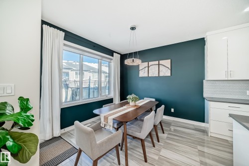 Dining area featuring baseboards - 3716 46 Avenue, Beaumont, AB - Indoor Photo Showing Dining Room