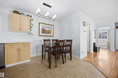 Dining area with baseboards and hanging lights - 2340 30 Avenue, Edmonton, AB - Indoor Photo Showing Dining Room