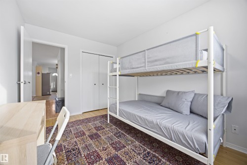 Bedroom featuring light wood-style flooring and a closet - 2340 30 Avenue, Edmonton, AB - Indoor