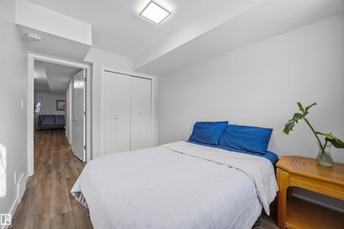 Bedroom featuring wood finished floors and a closet - 2340 30 Avenue, Edmonton, AB - Indoor Photo Showing Bedroom