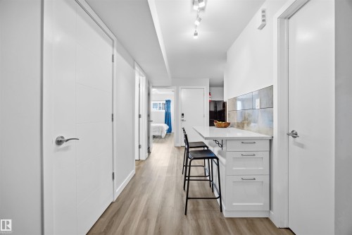 Hall featuring light wood finished floors - 2340 30 Avenue, Edmonton, AB - Indoor Photo Showing Other Room