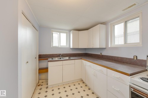 10907 67 Avenue, Edmonton, AB - Indoor Photo Showing Kitchen With Double Sink