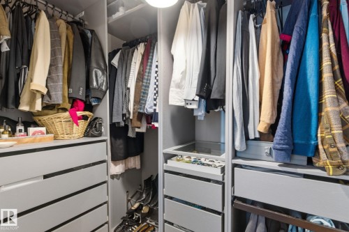 View of walk in closet - 18717 57 Avenue, Edmonton, AB - Indoor With Storage