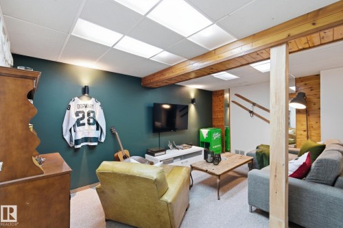 Carpeted living room with a paneled ceiling - 18717 57 Avenue, Edmonton, AB - Indoor