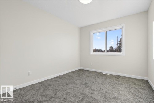 Carpeted empty room featuring baseboards - 10506 162 Street, Edmonton, AB - Indoor Photo Showing Other Room
