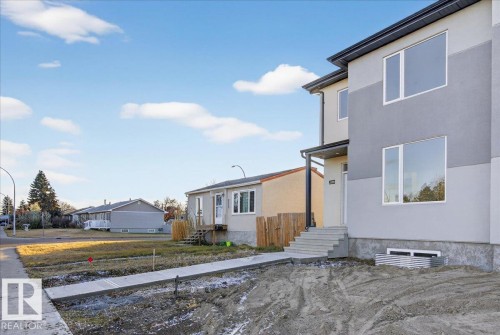 Rear view of property featuring stucco siding - 10506 162 Street, Edmonton, AB - Outdoor