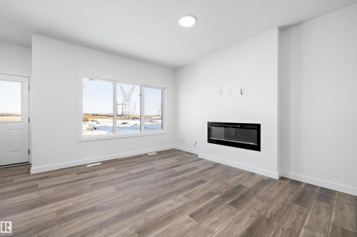 19304 29 Avenue, Edmonton, AB - Indoor Photo Showing Living Room With Fireplace