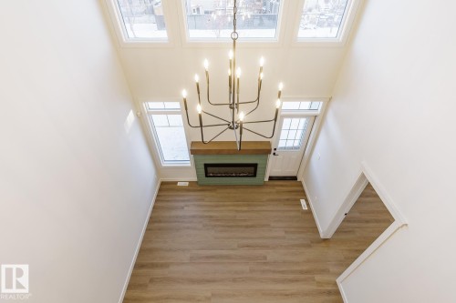 17537 62A Street, Edmonton, AB - Indoor Photo Showing Other Room With Fireplace