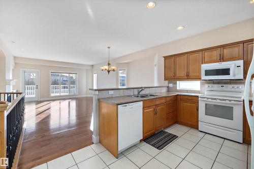 7 17603 99 Street, Edmonton, AB - Indoor Photo Showing Kitchen With Double Sink