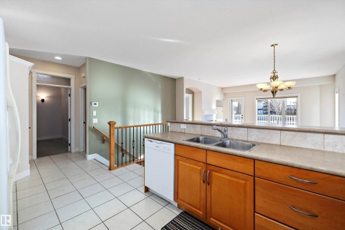 7 17603 99 Street, Edmonton, AB - Indoor Photo Showing Kitchen With Double Sink