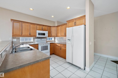 7 17603 99 Street, Edmonton, AB - Indoor Photo Showing Kitchen With Double Sink