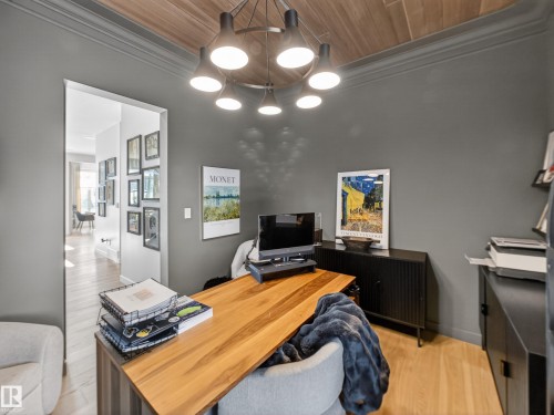 Office featuring wood ceiling, crown molding, and light wood-type flooring - 5507 Chegwin Point(E), Edmonton, AB - Indoor Photo Showing Office