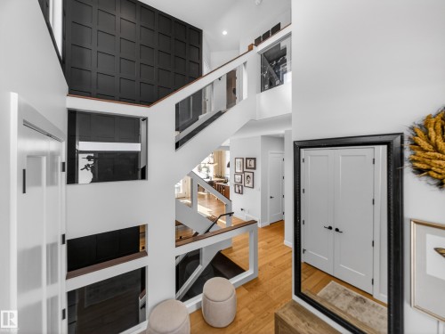 Foyer featuring light wood-style flooring and a high ceiling - 5507 Chegwin Point(E), Edmonton, AB - Indoor Photo Showing Other Room