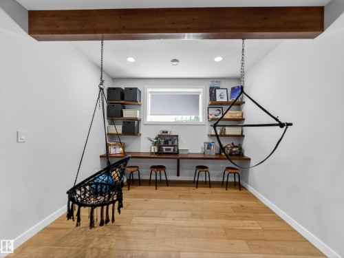 Office with light wood-style flooring, recessed lighting, and built in desk - 5507 Chegwin Point(E), Edmonton, AB - Indoor Photo Showing Other Room