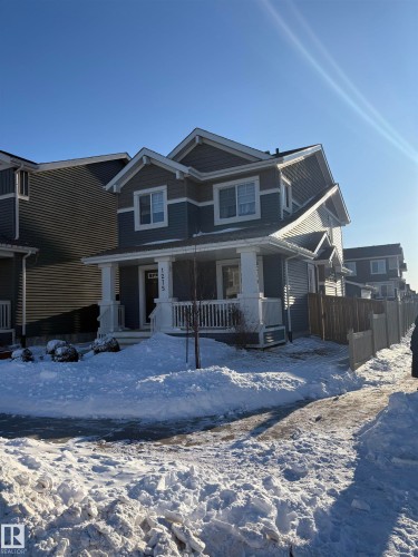 View of front of house featuring covered porch - 1275 Chappelle Boulevard Sw, Edmonton, AB - Outdoor With Deck Patio Veranda With Facade