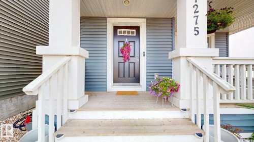 Property entrance with a porch - 1275 Chappelle Boulevard Sw, Edmonton, AB - Outdoor With Exterior