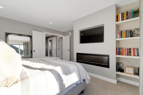 17437 5A Avenue, Edmonton, AB - Indoor Photo Showing Bedroom With Fireplace